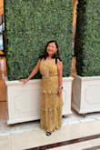 This was the perfect look I was going for to attend a friend's optional black tie wedding.  I did not want to wear a gown, but something that was special and elegant beyond a summer dress.  While I'm short, the dress didn't need to be altered.  The only complaints I have are 1) that the neck line is a bit loose so I used double sided tape to make sure it's closed, 2) the black band around the waist was really tight so it's not as comfortable.  I tried to upsize and the over dress was too big so maybe it's the proportions, 3) the side zipper is really hard to close especially around where the black band is because there's a notch that the little zipper had to climb over.  

Overall I'm very happy with it! - Elsa P.