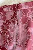 This set is very pretty and fits true to size. I chose to return it though because the quality of the fabric and stitching is not very good. There are uneven sloppy seams on the bottom layer or fabric that are visible through the sheet top layer. It looks too cheap to wear to a nice event. - Hannah S.