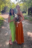 I wore this dress as a bridesmaid and loved the color and texture of the fabric. The fit and length were perfect for me and very flattering. The slit did not rise up too high to cause issues while sitting or dancing. Perfect for a warm, summer wedding! - Greta D.