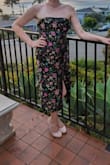 I got this dress in black and it was outside of my comfort zone, but I ended up really loving it. The other reviewers are correct that the sizing is challenging. There is absolutely no give, so it will either work or it won't and there isn't much in between. The slit is very high and can make sitting a challenge. All that being said I got a ton of compliments on the dress and felt really good in it.  I don't think it's built to last, but I got it on sale and for the price a few good wears is enough. - Katie R.