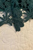 This dress runs small. In addition, there were mismatched front seams that were very obvious. It's like the lace panel in front was cut an inch higher than the side panels. It was final sale, so was out of luck for a return! - Bre B.