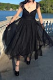 Absolutely love this dress! I wore it to a wedding. It has the flowy skirt of my dreams!! It runs just a tad bit big!! And you wanna pack a steamer for the under layer if you have to travel with it in a suitcase!! - Erica T.