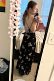 Oh, this dress is absolutely beautiful, I also purchased this dress for a beach vacation. It does look slightly fancier in person than it does in the photo. The fabric is really soft and fluffy and it is a really flattering dress. - Caley L.