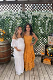 I loved the dress. I am short but I knew ordering a large dress would fit long. I just pinned it below my breast line and it fit fine. I was 8 months at the time of the photo shoot. It fit me perfectly. I loved the style. I also wore to the baby shower. I got a lot of compliments. - Jessell M.