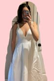 First of all, it came in a small box, so it needs ironing now. I'm not sure if I can iron it. On the other hand, it fits really well, even the length of the dress is surprisingly great. The only issue was breast area was big so I had to get a push-up bra (it wasn't easy to find one) and then everything worked out well. - Melis U.