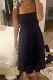 This dress is very cute and perfect for my petite frame. I got an extra small because they were all out of my normal small and it fits perfectly! It's longer than what the model shows, but I am so short that I expect things to be this way. - Sarah F.