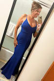 Absolutely beautiful dress. Ordered a small and I'm 55/130 pounds fits like a glove.  It's heavier material which I feel hides what u want it to and shows off what you like!  I'm a 34DD so it was a bit sexy for a bridesmaid but still love it!! - Stefanie P.