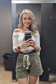 I'm normally an XS elsewhere but this bodysuit would be super duper tight if I didn't get a small and even the small is a little tight. I love this bodysuit though and was perfectly fine with the way it fits, just takes a little work to put on. - Jessica G.