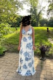 This dress fit great! It looks just like the picture and the material was good quality for a wedding or formal event! Because it's a wrap dress, it's easy to adjust to your waist size, and as a 32DDD that's always appreciated. There is a little clasp button in the bust to keep the neckline in place, which I don't usually like because with my bust there's usually not enough room and it pulls on the button, but it actually worked perfectly. The dress was a little long on me but with decent heels (~4in), or hemming the dress that would have been fine. I bought this for a mix-and-match bridesmaid dress (my assignment was white with blue floral). Unfortunately, I had to return the dress because the bride wanted true white, and this is definitely more off-white/cream. Lulu's team was great and made the return super easy. - Cathleen Y.