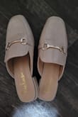 Very cute shoe. Fits true to size. A little slick on the bottom. It does trap air and make a noise sometimes. - Whitney F.
