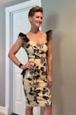 I didn't end up wearing this one, but the people I showed all loved it. The shoulder tulle and beading are black just FYI. Great for a night out, a wedding, or a cocktail party. It fit me perfectly without being too tight. I'm wide in the shoulders, a slim/athletic build. Good quality, easy exchange, and return process. Great price! - Misty W.