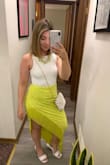 I love this skirt! The color is one of my favorites and I also love fringe! I'm short so without a little heel the skirt would drag on the floor; Just an FYI. It fits very comfortably in the waist and I got a size M. I WILL say that the back will show every bit of your booty shape, so be ready for that if you're not fond of your behind because it's very fitted back there, lol! - Nikki L.