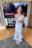 I bought a size small and it fits perfectly! It makes my figure look great and is 1/2" above the floor in the back when I wear 3" heels. I was looking for a dress to wear to a summer outdoor wedding in Charleston and this dress is ideal. It is comfortable, fits well at the top, and I am able to wear it with a strapless bra. The fabric looks high quality but is breathable. It does appear to be delicate so it would not be a good idea to buy a size that is too tight. It is now absolutely my favorite dress and my husband wants me to buy it again in a different color. - Robin B.