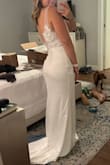 I was so hesitant to buy a wedding dress online but I bought 3 from Lulu's and they are VERY good quality! I would recommend them to anyone doing a smaller wedding or who doesn't want to spend thousands on a dress. All three dresses that I tried on were great quality and double lined so they were very flattering on my body. If I kept it, I would just get the bottom hemmed (I'm short) and maybe take it in around the bust so it fits better. Ultimately, I decided to go with another dress, but I LOVED this one and considered just keeping it as a backup. - Sarah R.