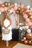 I absolutely loved this dress! I wore it for my bridal shower and it was SO flattering. The tiers also make it so you don't need to wear a bra. I have very big breasts and never can go braless but I did with this one. - Hannah C.