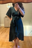 I'm very petite with a small chest. I ordered XS and it fit perfectly except for the waist, [which] was super tight with no stretch. No reason for it to be so tight since it has the tie to cinch the waist. It wouldn't be comfortable to wear at an event or if I ate a little. So I had to return and order a Small. Now it's a little loose up top, but it works. I love the sleeves. They are super cute. My favorite is the fabric because it's not just a solid color and gives it an elegant/upscale look. I will probably tack the chest area so it stays closed. I like that it comes with a liner so if the front opens, there's still coverage underneath - Haley K.