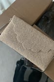 This clutch is stunning, and I love the strap. I purchased this for a wedding, and it unfortunately arrived with missing beading. I don't have the option of returning this because the event is tonight, and I don't have any other options. - Jackie B.