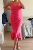 It fits exactly as pictured, is very comfortable and stretchy, and really flatters my body! I absolutely love this dress! - Luciel E.