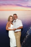I didn't have the dress altered. I bought it and lost 5 lbs. It was big but I still love it. - Theresa J.