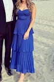 This dress is beautiful and so flattering. The royal blue was so vibrant and I got so many compliments. I wore it to a wedding and was comfortable all night long - Nicole F.