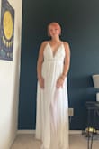 I wanted something low-cut and flowy. This one is much comfier than some other outfits I tried and really works well with my smaller chest. It's also really long so I needed taller shoes. I'm a bit nervous that the straps could break. They're so thin, and the dress is kind of heavy. This is a size large. - Cami B.