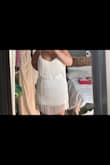 I absolutely loved this dress, but my booty was completely out of it. I loved it so much that i am actually making it into a cropped shirt. I bought it for my disco cowgirl themed bach party!!! I would say if you are shorter it is definitely true to size and will be perfect! I'm 5'8" and got a XL, i have a curvy body shape and normally wear L/XL in some dresses! - Ashleigh C.
