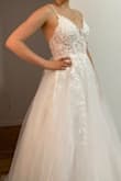I was looking for a wedding dress and this was it! It needed no alterations and was beautiful and elegant! - Sylver D.