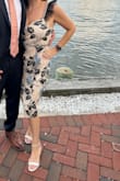 This dress is stunning! I received more compliments than ever before on a dress. The beading on the floral pattern and the straps/belt area make this dress look high-end. It was comfortable, and I highly recommend it! I did trim the gauzy ruffles on the straps so they weren't as big as when it arrived. - Melissa A.