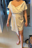 This dress looks so cute in photos. Maybe it's because I ordered the white but do not do it. It looks like a toga party dress on. The first layer fits tight and good, but the outer layer with the extra fabric is so baggy and loose. - Leeza N.
