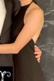 Bought this dress for a wedding. The dress was a bit long if you are not tall (I am 5'10" and the length was perfect on me but only with four inch heels. It stayed put really well and I didn't have to wear a bra. Looked really high quality and can be worn for multiple occasions. - Alison S.