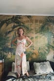 My future sister-in-law picked this dress out for me. At first, I thought it was not my taste but after trying it on it looks amazing and I absolutely LOVE it. It fits like a glove and the fabric feels beautiful. It will be spot-on for a Florida beach wedding! Thank you. - Aoife R.