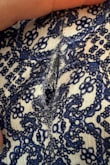 I wore this once to a family get-together only for a few hours and the back split. I've never had that happen in my life. The sizing was a size bigger for me as well. Cheap fabric, would not recommend. - Jennifer M.