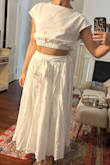This is probably the highest-quality item I've gotten from Lulu's. The fabric is thick enough that it's not see-through and feels pretty high quality. I vary between S and XS with Lulu's, and for this piece, I sized down - I'm glad I did. The skirt is a little on the heavy side, so you'll want the waistband to be snug and hit right at your natural waist. I was worried the top would be too small (I have broad shoulders) but it fit perfectly. The top and bottom can easily be mix and matched. Overall, great purchase, and I highly recommend it. - Abby S.