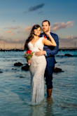 I love this dress! My husband and I eloped in Vegas, so I didn't have a lot of time to plan our wedding. This was one of the first dresses I saw online. I instantly fell in love with it. I went to bridal shops to try out more expensive dresses, nothing compared.  his dress is beautiful, it fits like a glove. I bought a rhinestone belt on Amazon to dress it up and it was perfect. I wore it twice, once for the ceremony and a second time for a wedding photoshoot in Isla Mujeres on my honeymoon. It was perfect.  I had it dry cleaned so it's in perfect condition and hopefully I can wear it again if we do a 10-year anniversary party. - Cindy M.