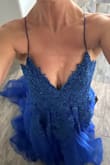 This dress is absolutely stunning in person! The color is even prettier in person and it fits perfectly. I love this dress. I can't wait to wear it to the ball in December. - Rebecca W.