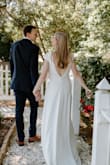 I was so hesitant about getting this dress. I stared at it for weeks and it even sold out of my size! As soon as one came back into stock I purchased it and I have absolutely no regrets! It fit me like a glove, no alterations necessary. I love the deep back, the trail, and the PRICE!! This is just such a beautiful dress! Thank you, Lulus! - Holly G.
