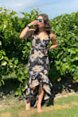 I bought this dress for a wedding I attended at a vineyard and thought it would be perfect for September weather! I ordered a small because that was my usual size on Lulus and the dress fit well, but had a lot of extra fabric on the front area. It made it bunch up awkwardly when I sat down. After I washed it, that helped a little bit. Otherwise, I love this dress and I will definitely wear it again! - Layla W.