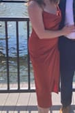 This dress was perfect and I'm so happy with how it fit. It fit my stomach perfectly without being too tight or too loose. - Zoee B.