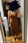Super soft and good thick material. It falls straight on the waist though and doesn't cinch in. Boobs are supported well in the dress without a bra. - Kat B.