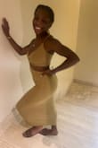 This dress fit perfectly, loved the length, however, I didn't like how the straps were always crooked when I tried to tighten them. I also didn't like the metal hardware on it, there should've been a better way to tighten them. - Nevaeh K.