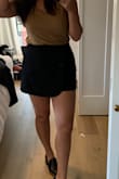 OK AMAZING!! This is so so so comfortable and flattering. It's a high-quality fabric that I have worn to work 3X already. We're having a heat wave, and I worked on video shoots and photographed a wedding in it. It's so perfect! It's a little funky how they are shorts on the back and a half skirt on the front, but it's kinda perfect because then people know [they're] shorts (especially for me at work bending down and all). It's so cute. I also see myself wearing it out with boots for sure. - Danielle D.