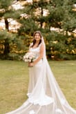 The dress is of great quality and fits true to size. It does have some stretch to it so it fits curves nicely. The color is more ivory than true white. Very classy and was perfect for my intimate backyard wedding. - Alex P.