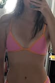 This bathing suit is very cute and comfortable. I love the straps and how they don't tie around your neck. Only thing to note is the triangle pieces are not adjustable and feel far apart on the chest. This is why I would order a smaller size if you have a smaller chest or like the triangle pieces to be closer together. - Larissa W.