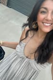 I love how it looks and fits true to size. I wish the neck strap was a little more substantial as it holds the majority of the weight. My neck was ready to be free after a long evening. Even so, I cant wait to wear this dress again. - Lindie V.
