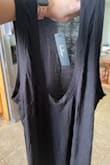 I was sent the complete wrong item and it will not let me return or exchange it for what I paid for. I was sent a basic black ribbed tank top. - Jaclyn W.