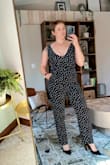 The models make these jumpsuits look flawless. I have tried a couple of Lulu's jumpsuits and after this one I'm done trying. For the most part I am a medium except when it comes to the polyester material. I'm pretty athletic and have a thicker muscle structure, and this jumpsuit is just not flattering on me. It's tight in the crotch, it rides up on my thighs, it smashes my boobs, it's too snug on my bum, it does have pockets though! 
I'll be exchanging it. Enjoy the terrible picture. - Abigail M.