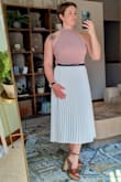 I bought this shirt specifically for this skirt. Very happy with the fit and style. Will definitely have to buy some pasties though. - Abigail M.
