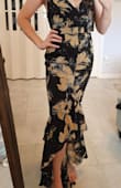 Pictures don't do the dress justice. It's beautiful when walking and dancing. Great wedding guest or fancy event dress. - Penelope L.