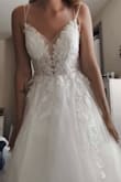 I love my dress because it fits like a glove, great material, and it was super affordable. You can definitely add more to the bust if you have a smaller chest like me. But overall beautiful, flattering and worth the price! Came in a garment bag too! - Shannon L.