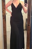 I loved this dress. It fit great and was so soft and comfortable. I usually feel like I need shapewear with tighter-fitting dresses, but not with this one. It's thicker but not too thick and it makes it gives it an almost shaping feel. (The picture looks a little odd at the top because I was alone and didn't do a great job tying it up.) - Jamie L.